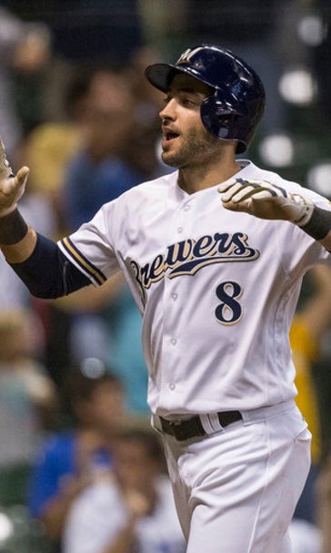 Perez's 2-run triple lifts Brewers over Rockies 6-4
